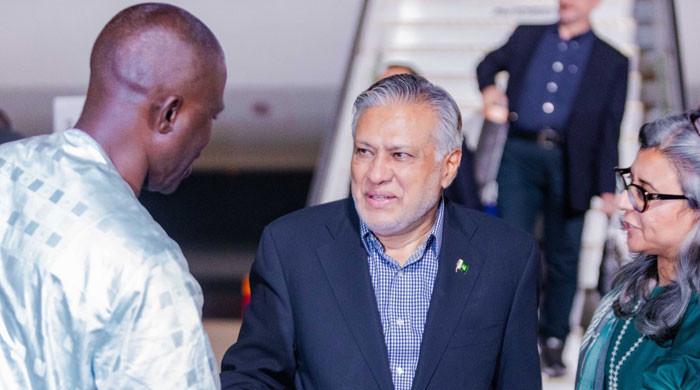 FM Ishaq Dar lands in Gambia to attend OIC moot