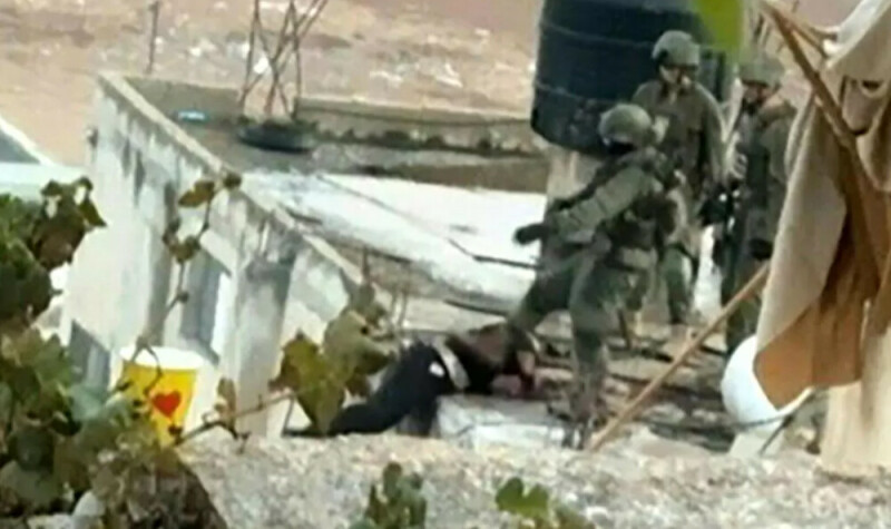 Footage shows Israeli soldier pushing body off roof in West Bank raid