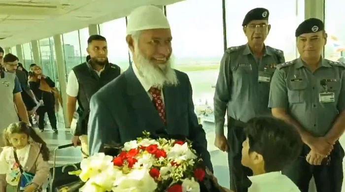 Dr Zakir Naik touches down in Pakistan